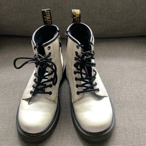 Dr. Martens white leather boots size 3. Lace up and zip closure.